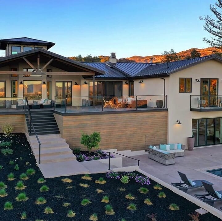 Realestate Napa Valley, California, USA. Backyard with upper and lower decks looking out over pool and surrounds.