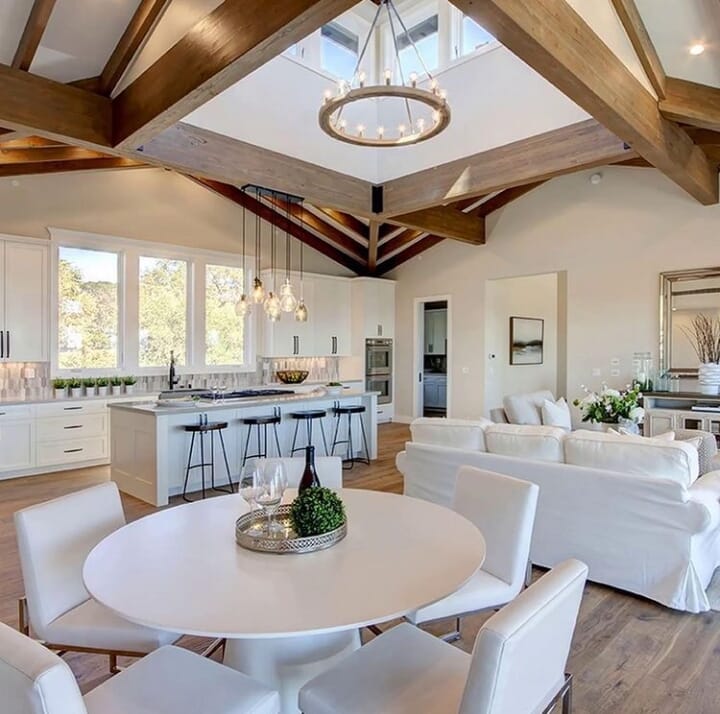 Realestate Napa Valley, California, USA.  Open kitchen dining and living area with exposed beams and views and hard wood flooring.