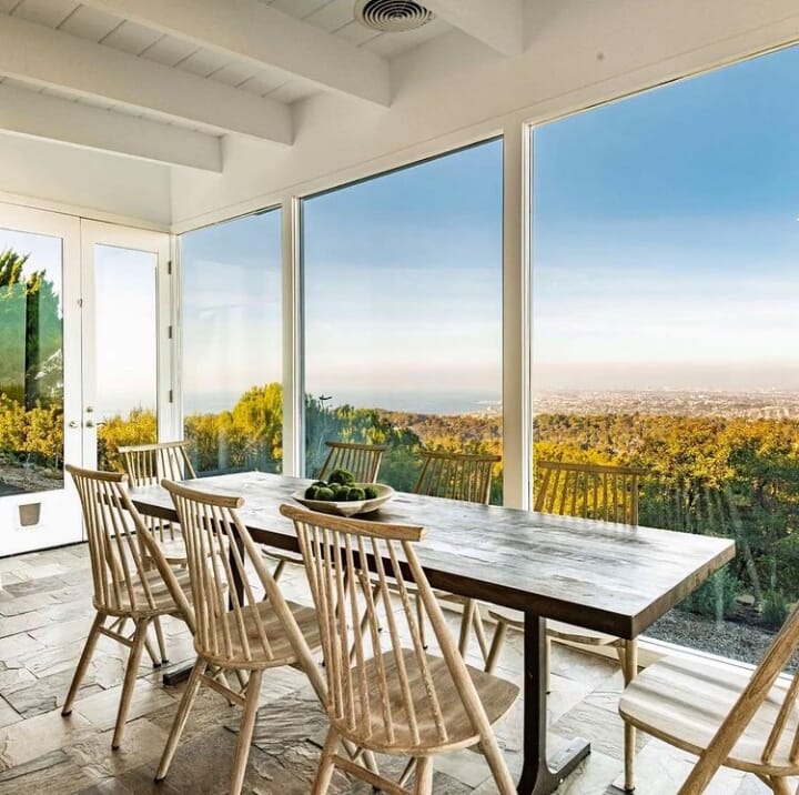 Realestate California, Palos Verdes, USA. Dining room at the rear of the house overlooking Palos Verdes Golf Course, Santa Monica Bay and L.A.